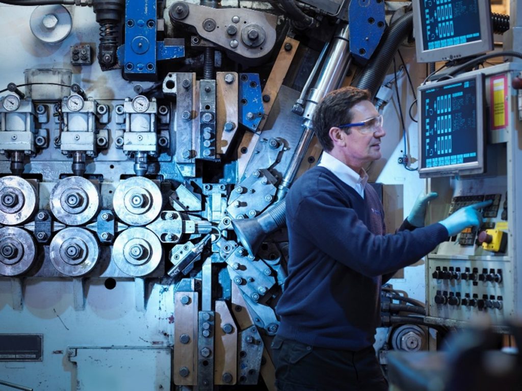 Picture showing a man working in industry control room